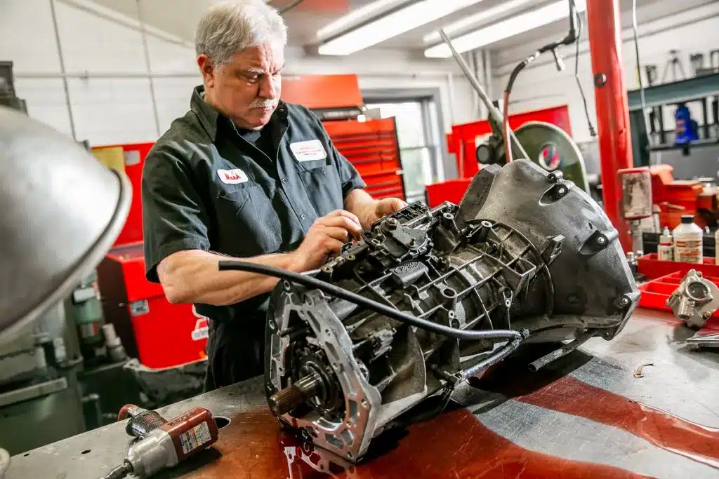 Ken's automotive and transmissions mechanic repairing transmission
