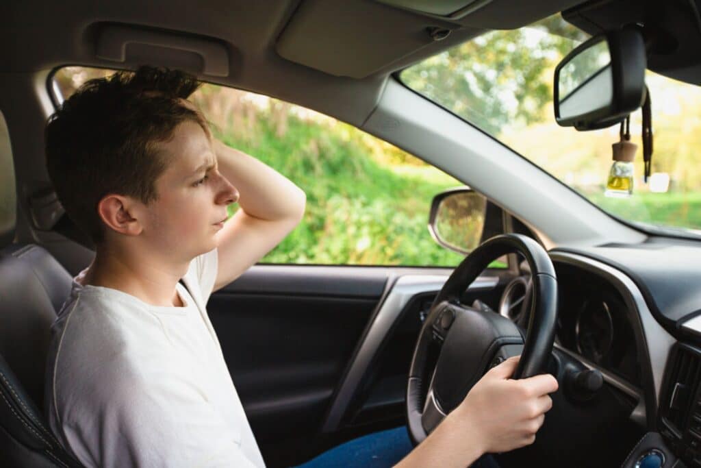 distressed motorist behind the wheel